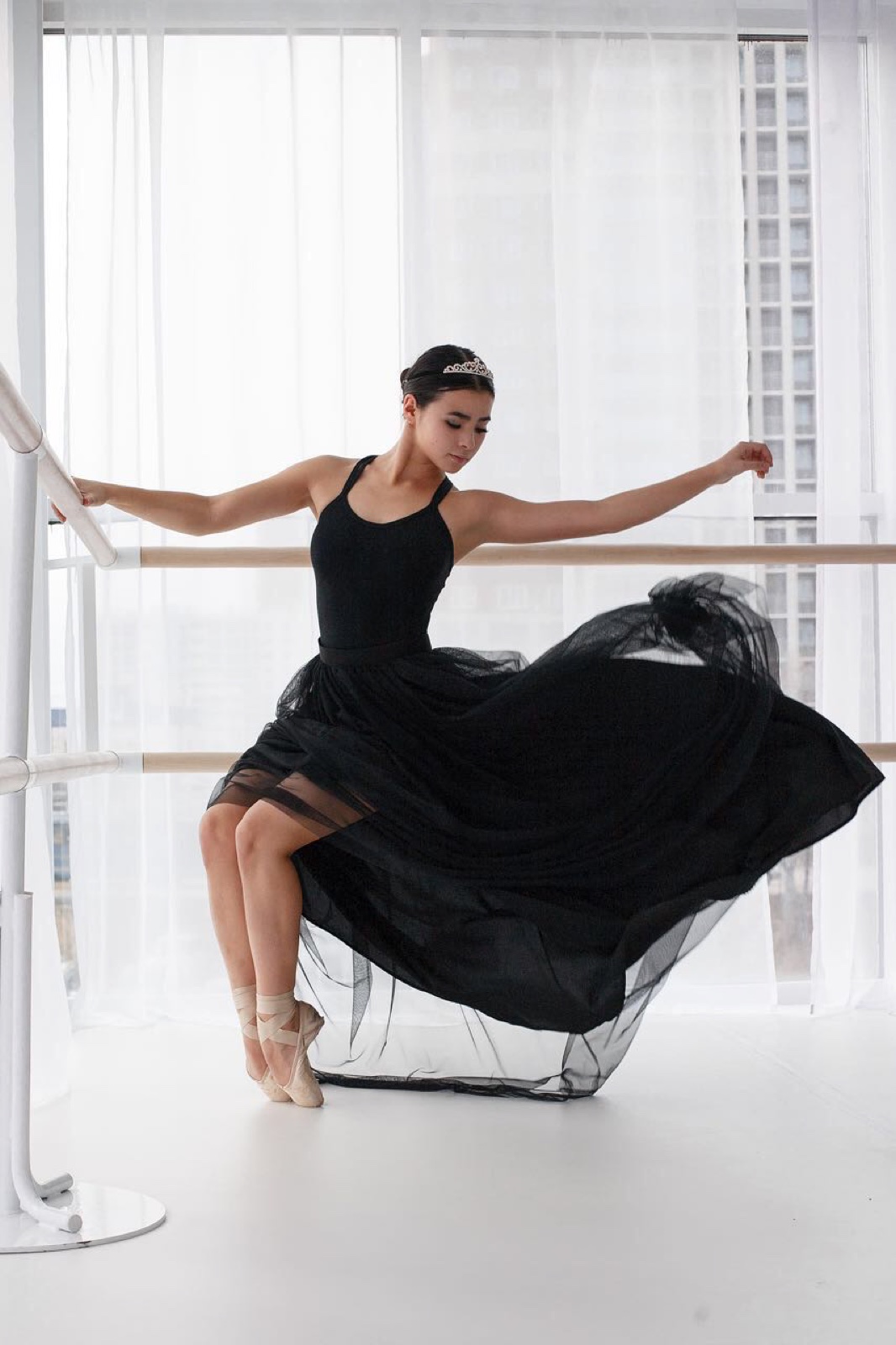 Lil Ballerine ballet teacher demonstrating classical movement in the studio